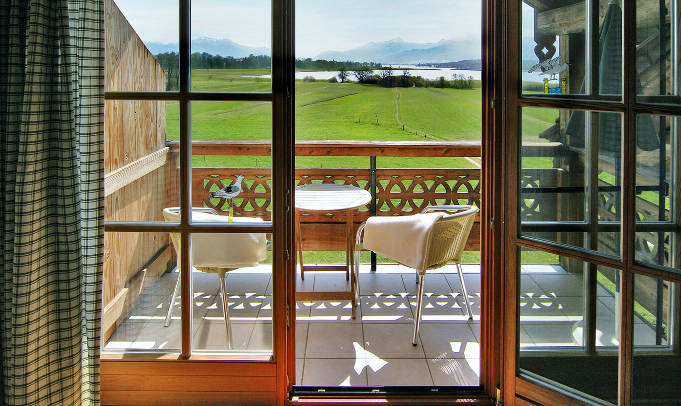 SeeCafe Toni's Ferienwohnungen · Chiemsee : Seecafe Toni am Chiemsee